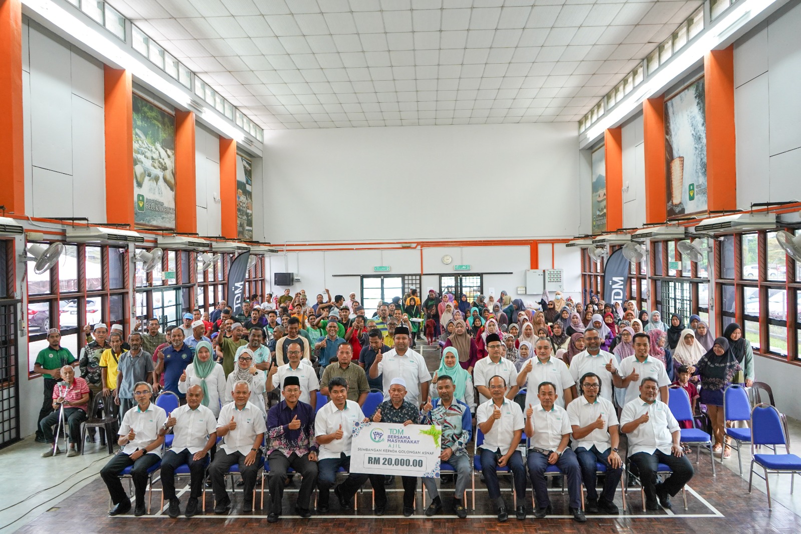 TDM Berhad Santuni Lebih 130 Asnaf di DUN Ajil